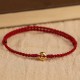 999 Gold Small Peace Buckle Red String Protection Anklet 999 Gold Small Peace Buckle Red String Protection Anklet