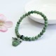 Laughing Buddha Cyan Jade Healing Bracelet Laughing Buddha Cyan Jade Healing Bracelet