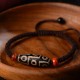 Tibetan Nine-Eye Dzi Prosperity String Bracelet