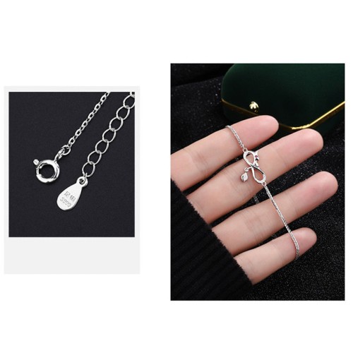 Year of the Dragon 999 Sterling Silver Zircon Knot Charm Bracelet Year of the Dragon 999 Sterling Silver Zircon Knot Charm Bracelet