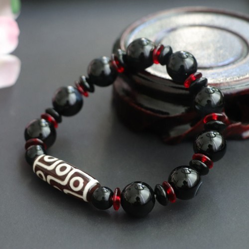 Black Onyx Nine-Eye Dzi Bead Wealth Bracelet Black Onyx Nine-Eye Dzi Bead Wealth Bracelet