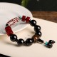 Tibetan Nine-Eye Dzi Black Onyx Wealth Bracelet