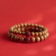 Peach Wood Lotus Cinnabar Wealth Bracelet