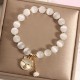 Cat's Eye Pearl Love Charm Bracelet Cat's Eye Pearl Love Charm Bracelet