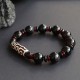 Black Onyx Nine-Eye Dzi Bead Wealth Bracelet Black Onyx Nine-Eye Dzi Bead Wealth Bracelet