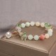 Cat's Eye Pink Crystal Peace Charm Bracelet Cat's Eye Pink Crystal Peace Charm Bracelet
