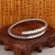 Retro Heart Sutra Twisted Design Balance Bangle