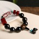 Tibetan Nine-Eye Dzi Black Onyx Wealth Bracelet