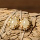 Hetian Jade Egg Copper Prosperity Earrings