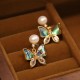 18K Gold-Plated Copper Shell Pearl Butterfly Stud Earrings 18K Gold-Plated Copper Shell Pearl Butterfly Stud Earrings