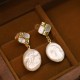 925 Sterling Silver Gold-Plated Baroque Pearl Healing Drop Earrings 925 Sterling Silver Gold-Plated Baroque Pearl Healing Drop Earrings