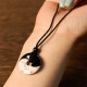 Black Obsidian White Turquoise Yin Yang Strength Necklace Black Obsidian White Turquoise Yin Yang Strength Necklace