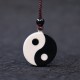 Black Obsidian White Turquoise Yin Yang Strength Pendant Black Obsidian White Turquoise Yin Yang Strength Pendant