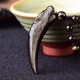 Black Obsidian Wolf Tooth Strength Necklace Pendant Black Obsidian Wolf Tooth Strength Necklace Pendant