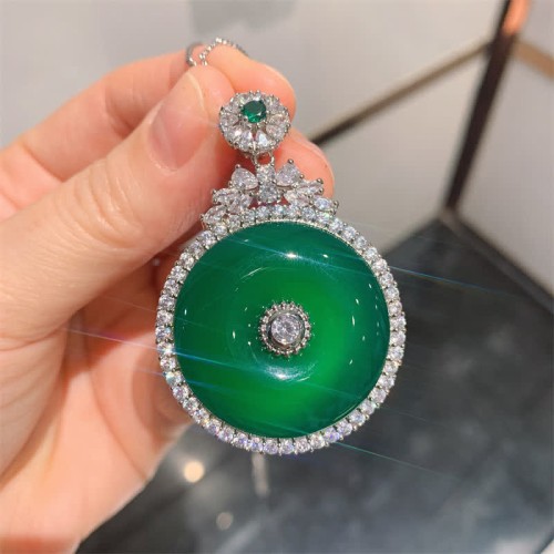 Green Chalcedony Round Peace Buckle Strength Pendant Green Chalcedony Round Peace Buckle Strength Pendant